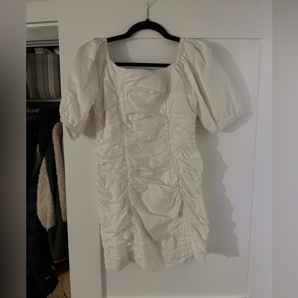 Brand new urban outfitters with tags white scrunch dress. Great fit. Size 2.